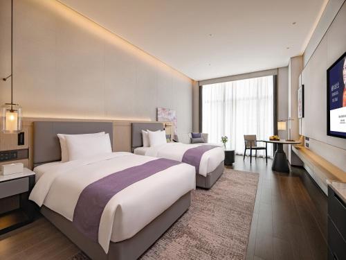 Imagen de la habitación del Hotel Grand Mercure Shenzhen Guangming. Foto 18