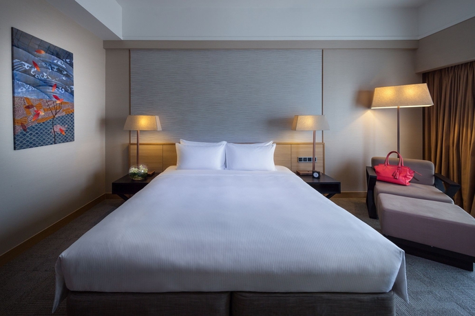 Imagen de la habitación del Hotel Grand Mercure Singapore Roxy. Foto 10