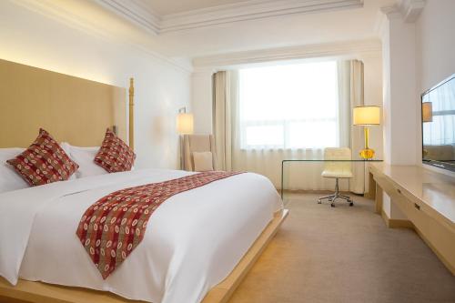 Imagen de la habitación del Hotel Grand Mercure Urumqi Hualing. Foto 17