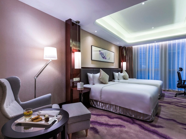 Imagen de la habitación del Hotel Grand Mercure Wuhan Qiaokou. Foto 9