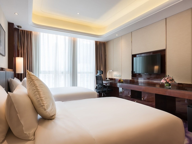 Imagen de la habitación del Hotel Grand Mercure Wuhan Qiaokou. Foto 10