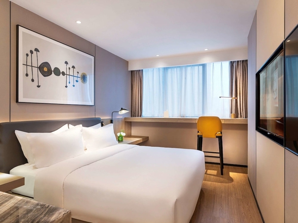 Imagen de la habitación del Hotel Grand Mercure Wuhan Qiaokou. Foto 11