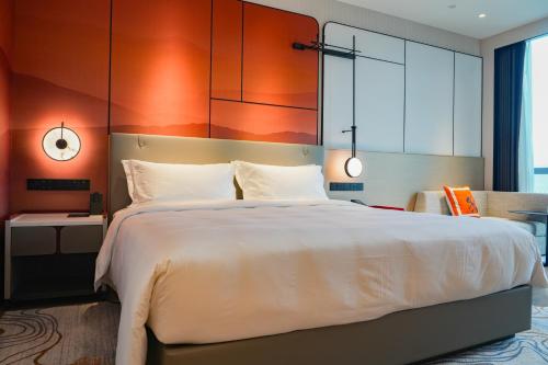 Imagen de la habitación del Hotel Grand Mercure Yichang Waitan. Foto 14