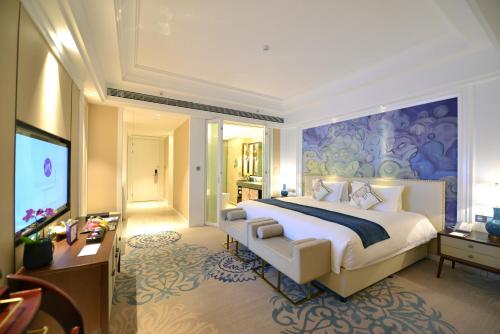 Imagen de la habitación del Hotel Grand Mercure Zhengzhou West. Foto 6