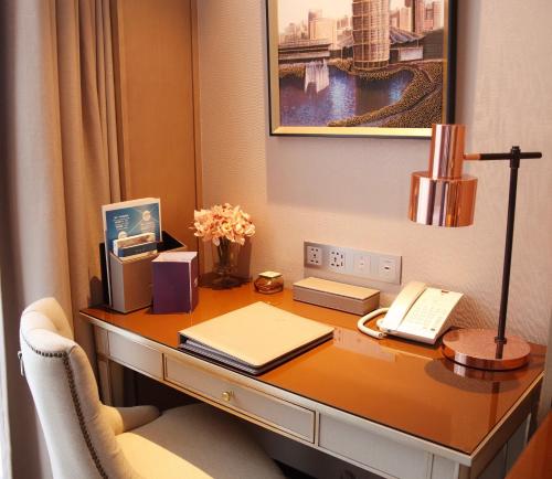 Imagen de la habitación del Hotel Grand Mercure Zhengzhou West. Foto 15