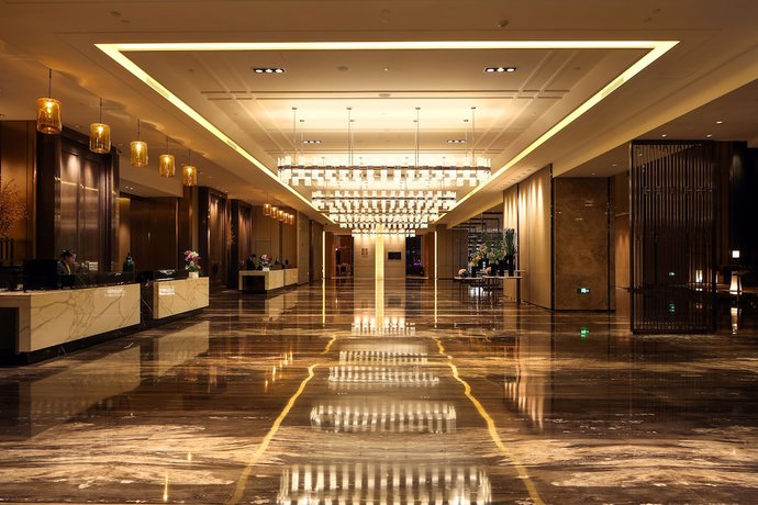 Imagen de los interiores del Hotel Grand Metro Park Beijing. Foto 18