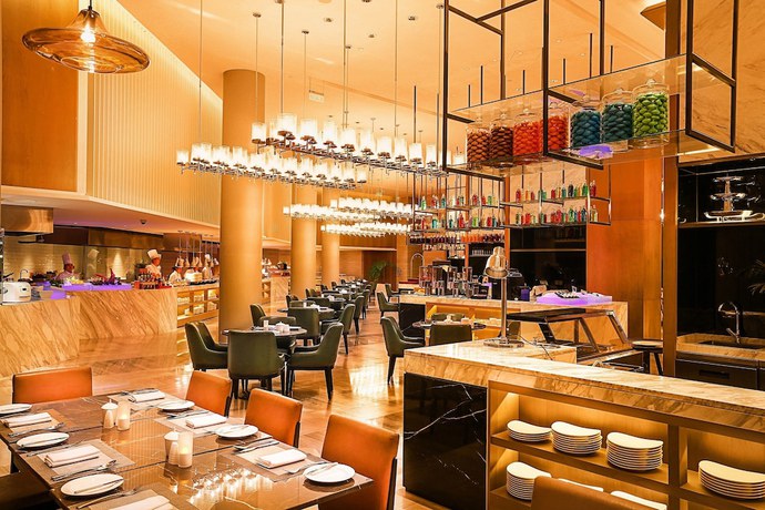 Imagen del bar/restaurante del Hotel Grand Metro Park Beijing. Foto 2