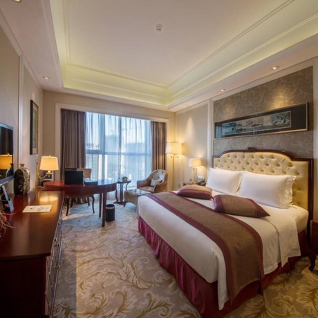 Imagen de la habitación del Hotel Grand Metropark Guofeng Tangshan. Foto 6