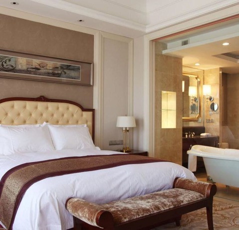 Imagen de la habitación del Hotel Grand Metropark Guofeng Tangshan. Foto 10