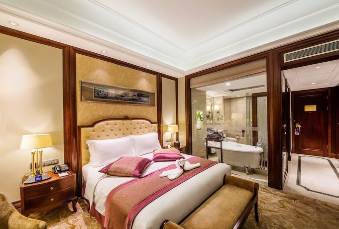 Imagen de la habitación del Hotel Grand Metropark Guofeng Tangshan. Foto 11