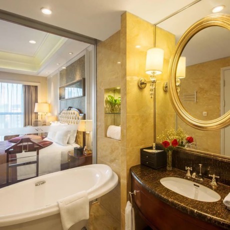 Imagen de la habitación del Hotel Grand Metropark Guofeng Tangshan. Foto 12