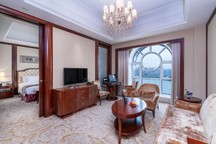 Imagen de la habitación del Hotel Grand Metropark Guofeng Tangshan. Foto 13