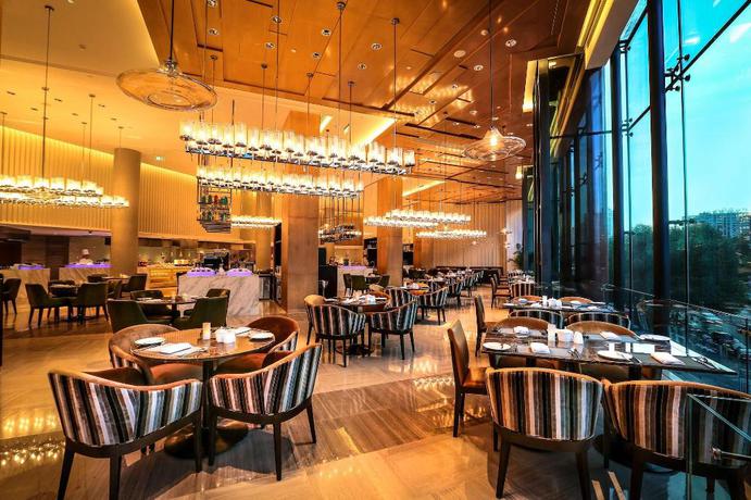 Imagen del bar/restaurante del Hotel Grand Metropark Hotel Beijing. Foto 5