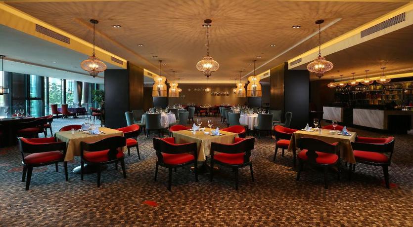 Imagen del bar/restaurante del Hotel Grand Metropark Hotel Beijing. Foto 6