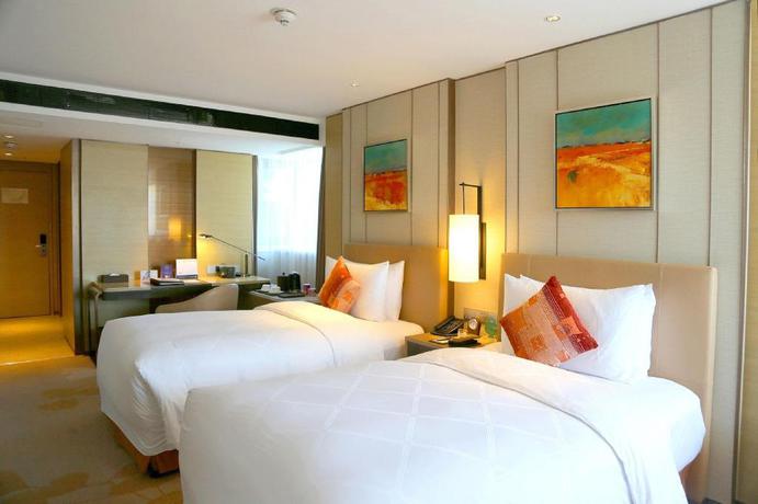 Imagen de la habitación del Hotel Grand Metropark Hotel Beijing. Foto 11