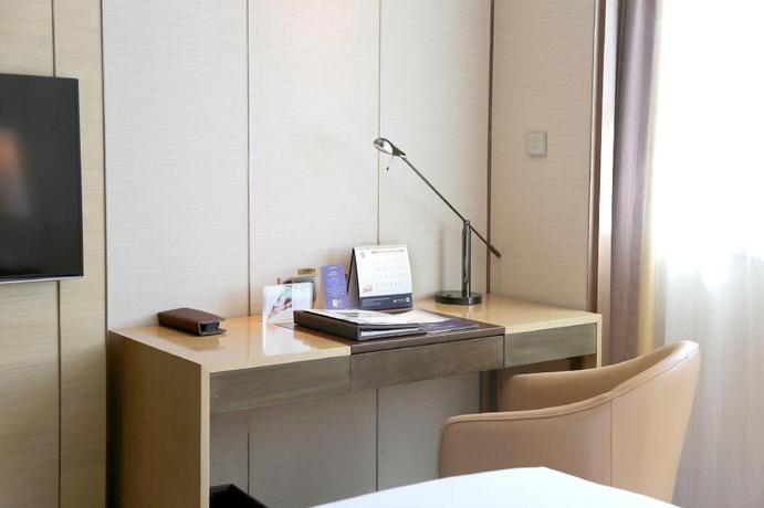 Imagen de la habitación del Hotel Grand Metropark Hotel Beijing. Foto 12