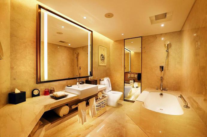 Imagen de la habitación del Hotel Grand Metropark Hotel Beijing. Foto 17