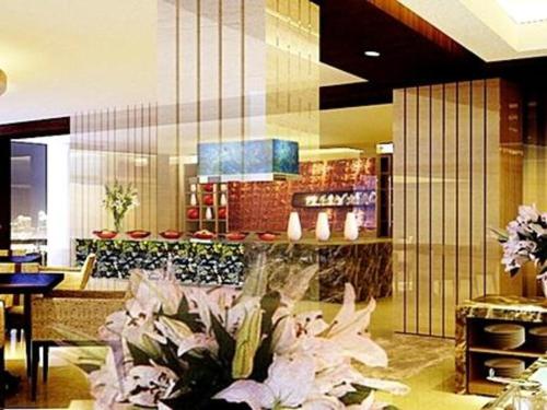 Imagen general del Hotel Grand Metropark Qingdao. Foto 8