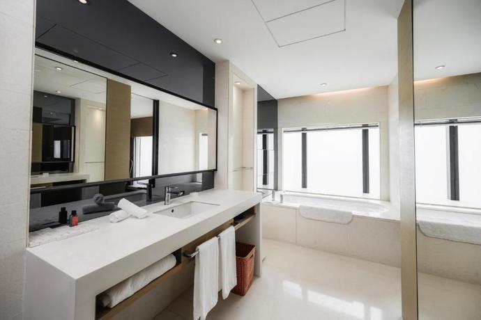 Imagen de la habitación del Hotel Grand Metropark Shanghai Pudong. Foto 4