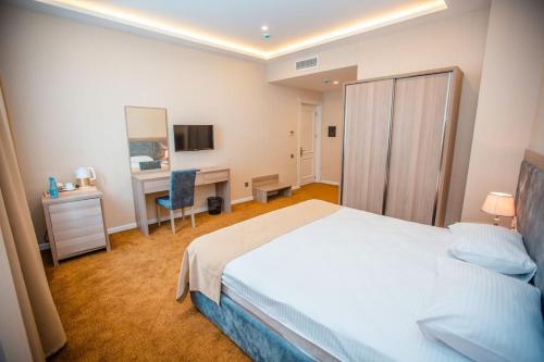 Imagen de la habitación del Hotel Grand Midway. Foto 3