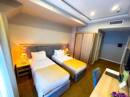 Imagen de la habitación del Hotel Grand Midway. Foto 4