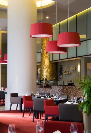 Imagen del bar/restaurante del Hotel Grand Millennium Al Wahda. Foto 4