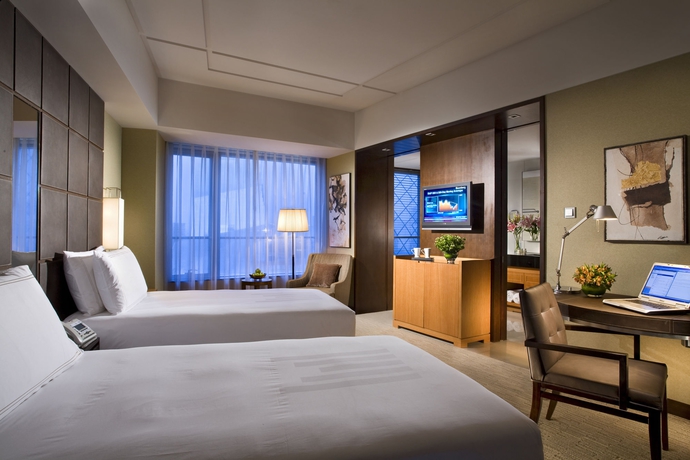 Imagen de la habitación del Hotel Grand Millennium Beijing. Foto 2