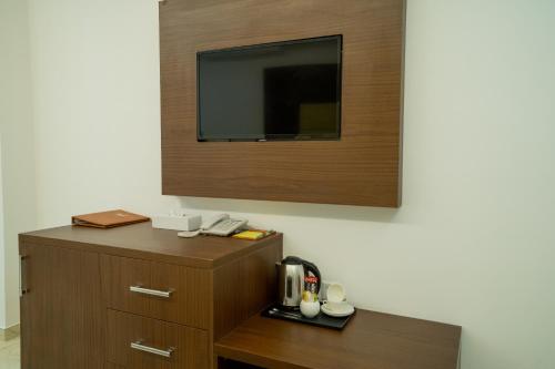 Imagen de la habitación del Hotel Grand Mirage. Foto 18