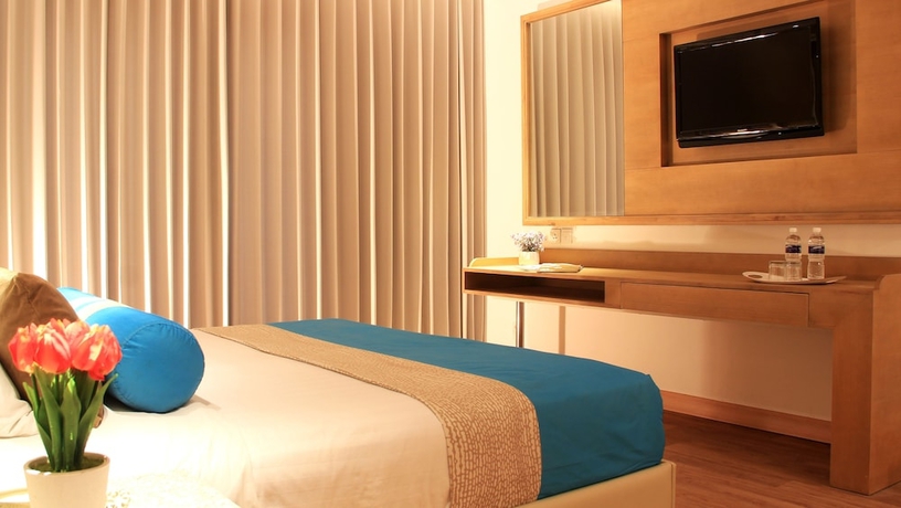 Imagen de la habitación del Hotel Grand Mirage Resort and Thalasso Bali. Foto 16