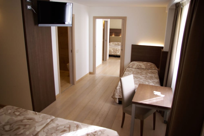 Imagen de la habitación del Hotel Grand Miramonti. Foto 10