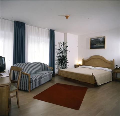Imagen de la habitación del Hotel Grand Molveno. Foto 10