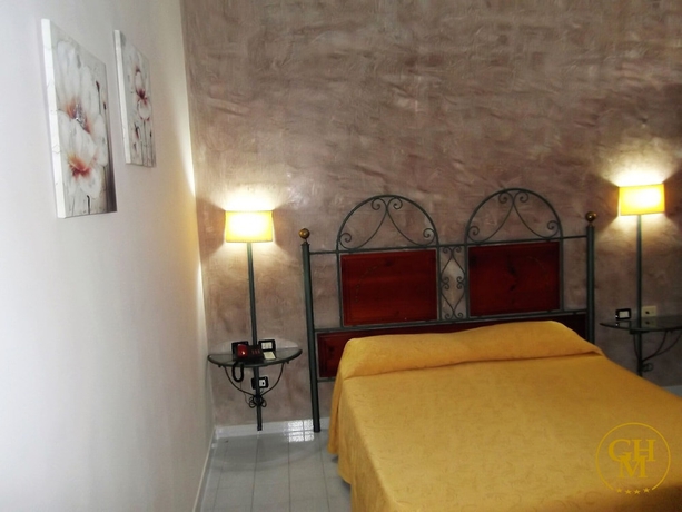 Imagen de la habitación del Hotel Grand Mosè. Foto 10