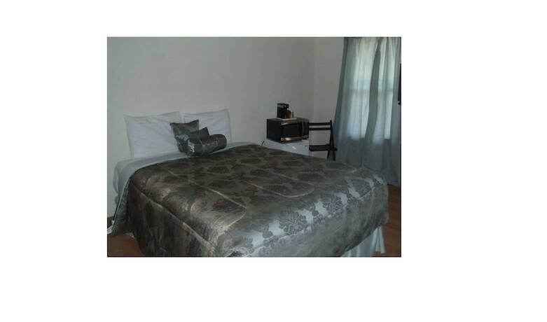 Imagen de la habitación del Hotel Grand Motel. Foto 11
