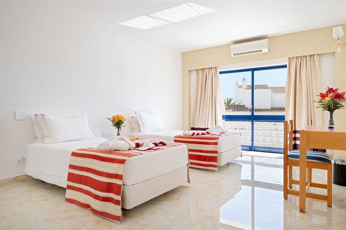 Imagen de la habitación del Hotel Grand Muthu Oura View Beach Club. Foto 10