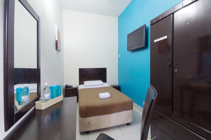 Imagen de la habitación del Hotel Grand Mutiara. Foto 12
