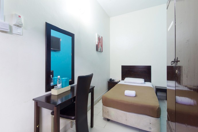 Imagen de la habitación del Hotel Grand Mutiara. Foto 15