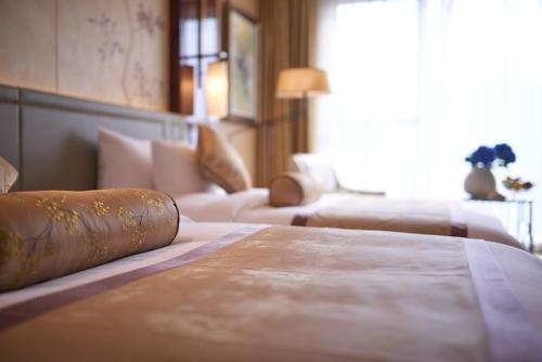 Imagen de la habitación del Hotel Grand New Centery Leshan. Foto 7