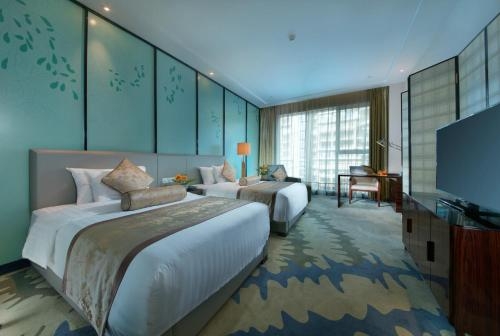 Imagen de la habitación del Hotel Grand New Centery Leshan. Foto 8