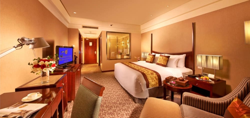 Imagen de la habitación del Hotel Grand New Century Binhai Tianjin. Foto 3