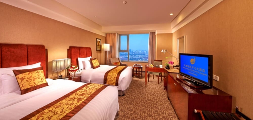 Imagen de la habitación del Hotel Grand New Century Binhai Tianjin. Foto 5