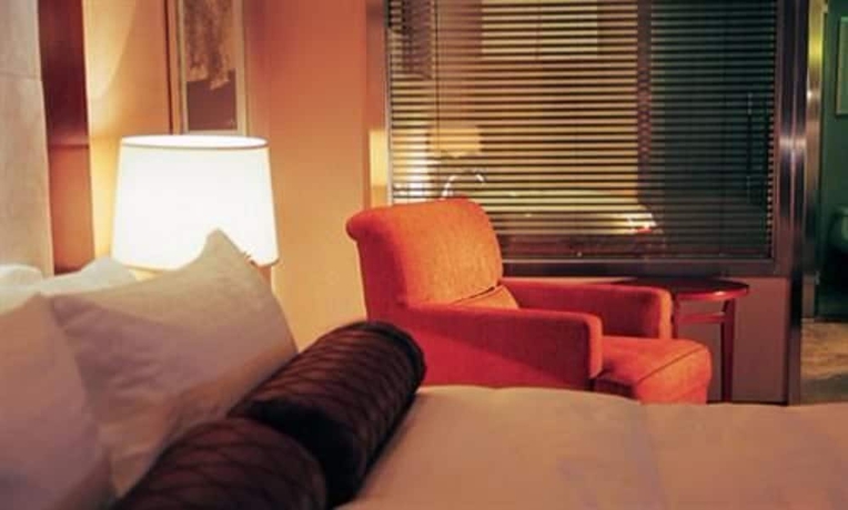 Imagen de la habitación del Hotel Grand New Century Binhai Tianjin. Foto 6