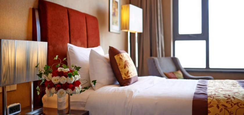 Imagen de la habitación del Hotel Grand New Century Binhai Tianjin. Foto 13