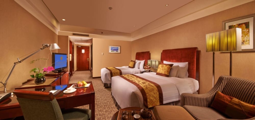 Imagen de la habitación del Hotel Grand New Century Binhai Tianjin. Foto 14