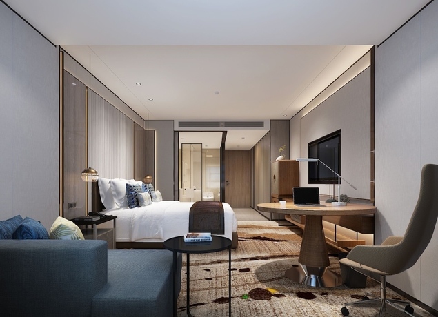 Imagen de la habitación del Hotel Grand New Century Chizhou. Foto 4