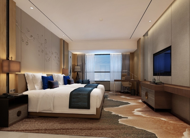 Imagen de la habitación del Hotel Grand New Century Chizhou. Foto 10