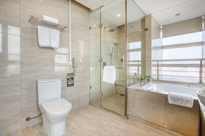 Imagen de la habitación del Hotel Grand New Century. Foto 19