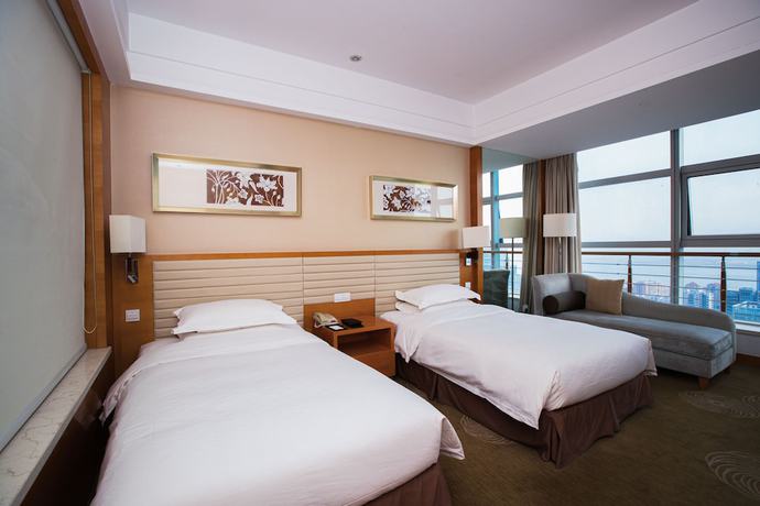 Imagen de la habitación del Hotel Grand New Century. Foto 20