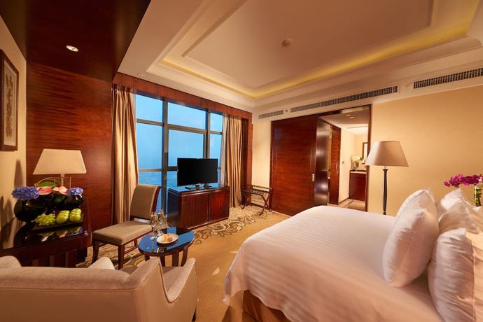 Imagen de la habitación del Hotel Grand New Century Hangzhou Sumtime. Foto 11