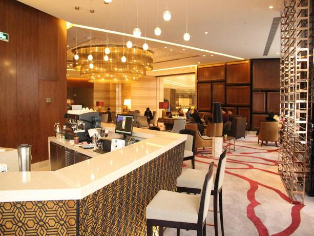 Imagen de los interiores del Hotel Grand New Century Hotel Fuyang. Foto 19