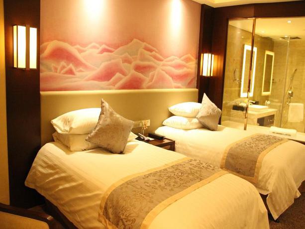 Imagen de la habitación del Hotel Grand New Century Hotel Fuyang. Foto 9